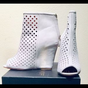 Rebecca Minkoff Women’s Perforated Wedge Booties